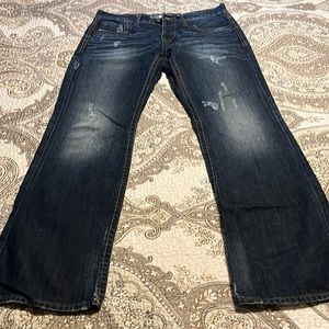 Buckle distressed dark jeans. Carter 32R
